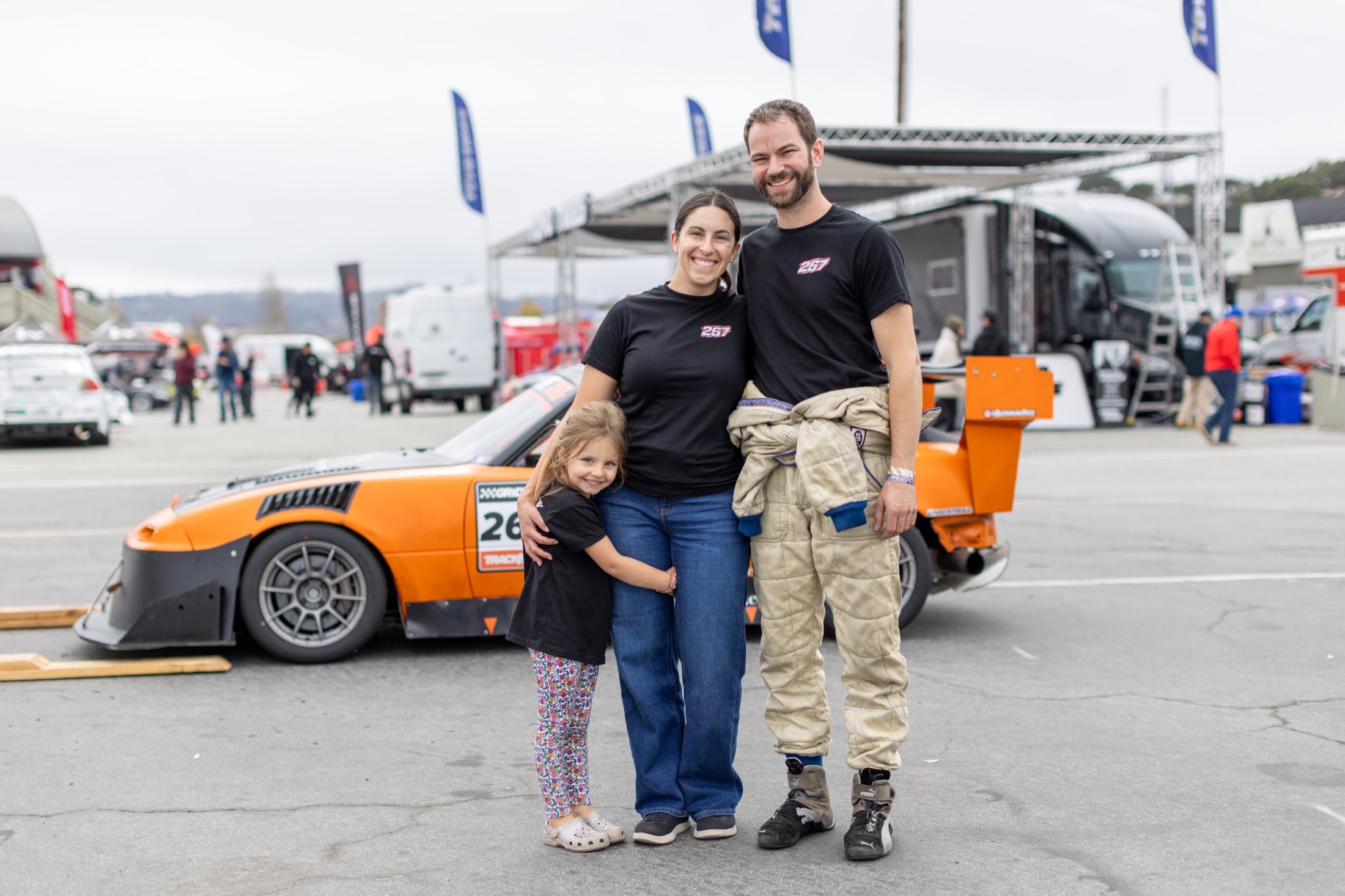 Nick Buchanan with his family and the number 267 Miata at Laguna Seca