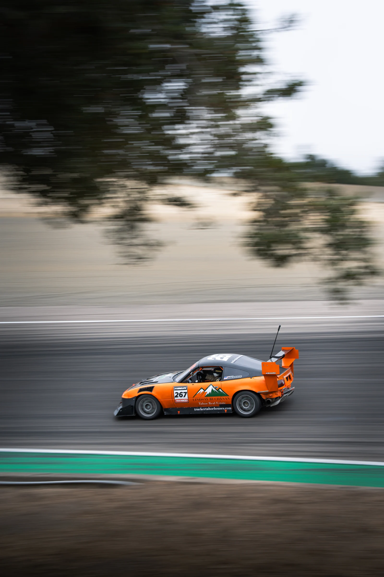 Panning photograph of the number 267 Miata at Laguna Seca